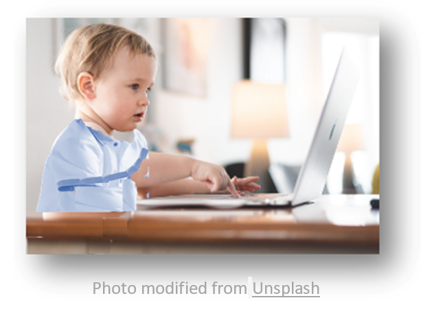 Photo of a child using a laptop