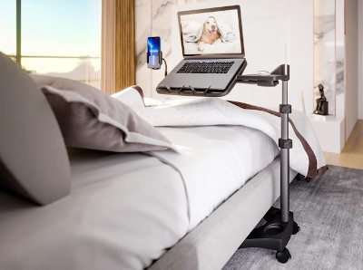 Photo of floor stand being used at a bed